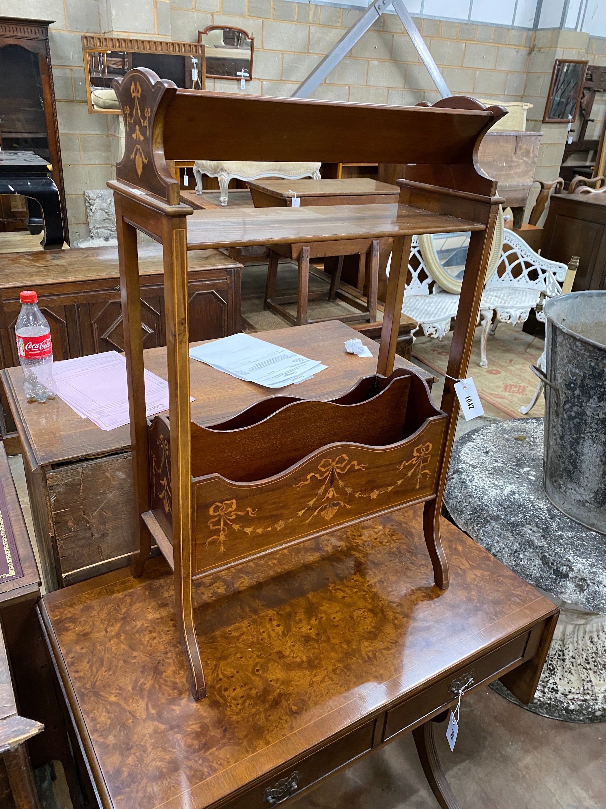 An Edwardian marquetry inlaid mahogany book stand combined magazine rack (mark for J.C. Vickery), width 53cm, depth 33cm, height 88cm